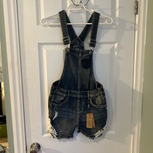 Silver, mid wash denim slightly distressed romper overalls resortwear vacation